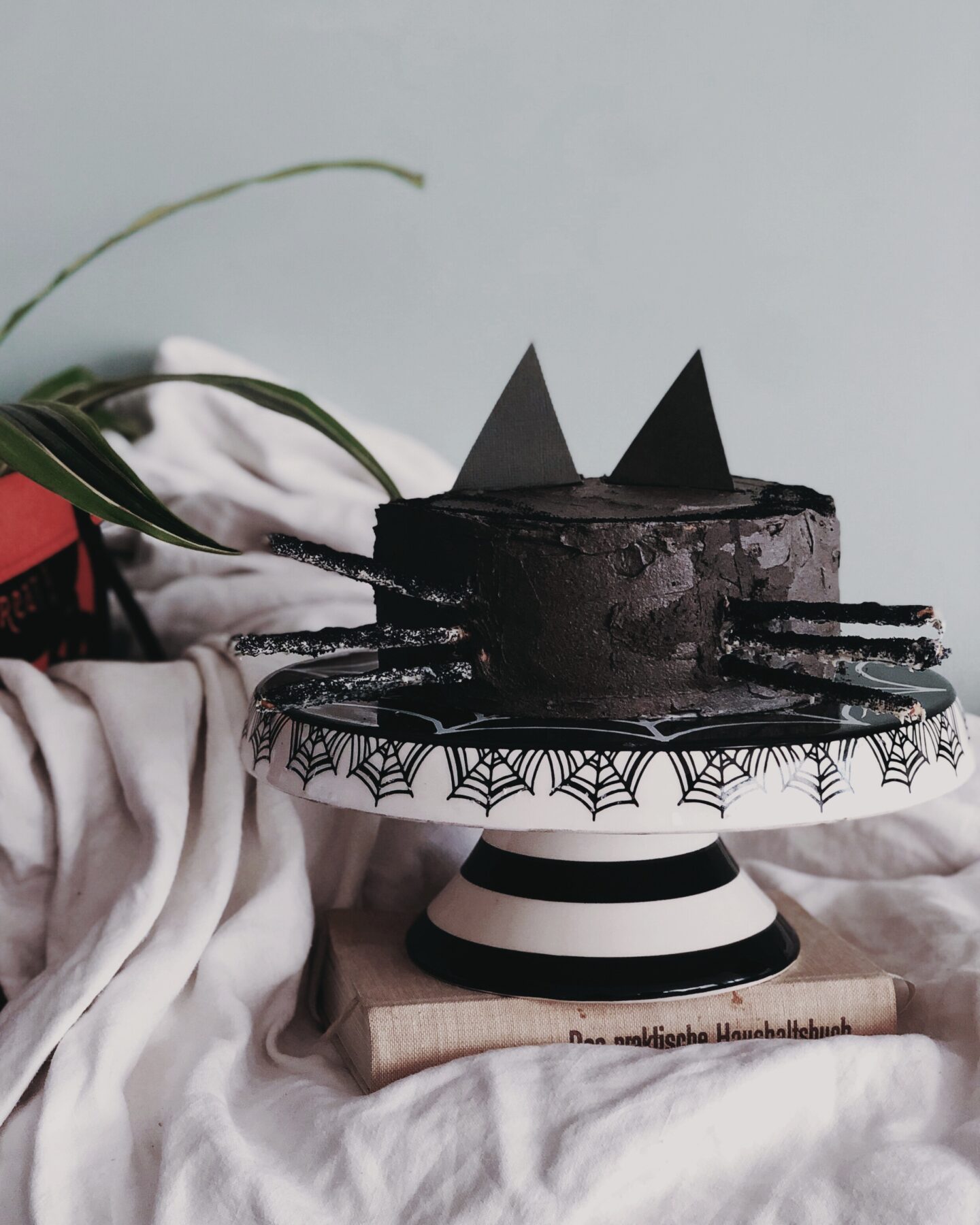 Halloween aesthetic minimal black cat cake