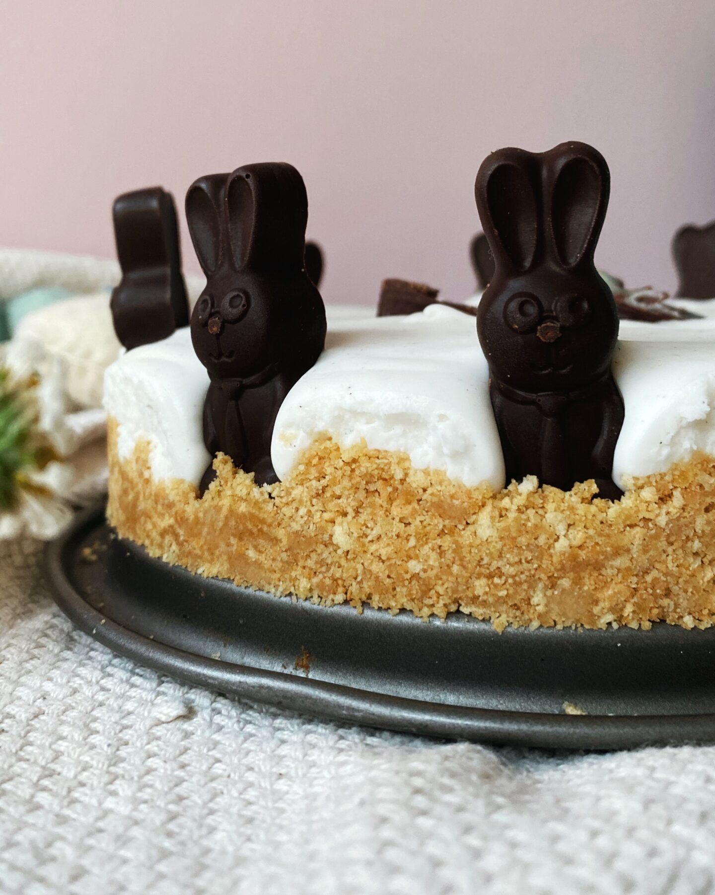 Close up of vegan chocolate bunnies on cheesecake